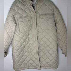 padded coat, with pocket.  cream color, long and comfortable